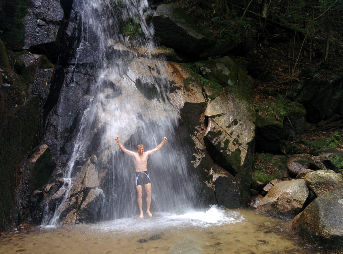 Cruise "meditating" under the waterfall 