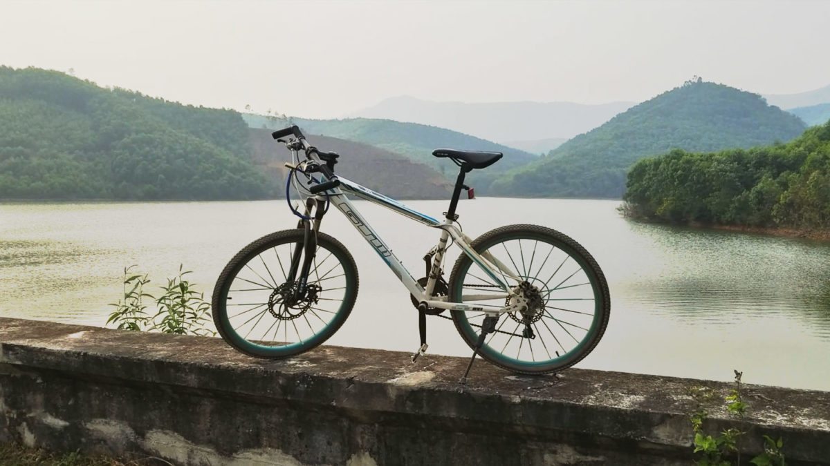 cycling in vietnam countryside mountains lake