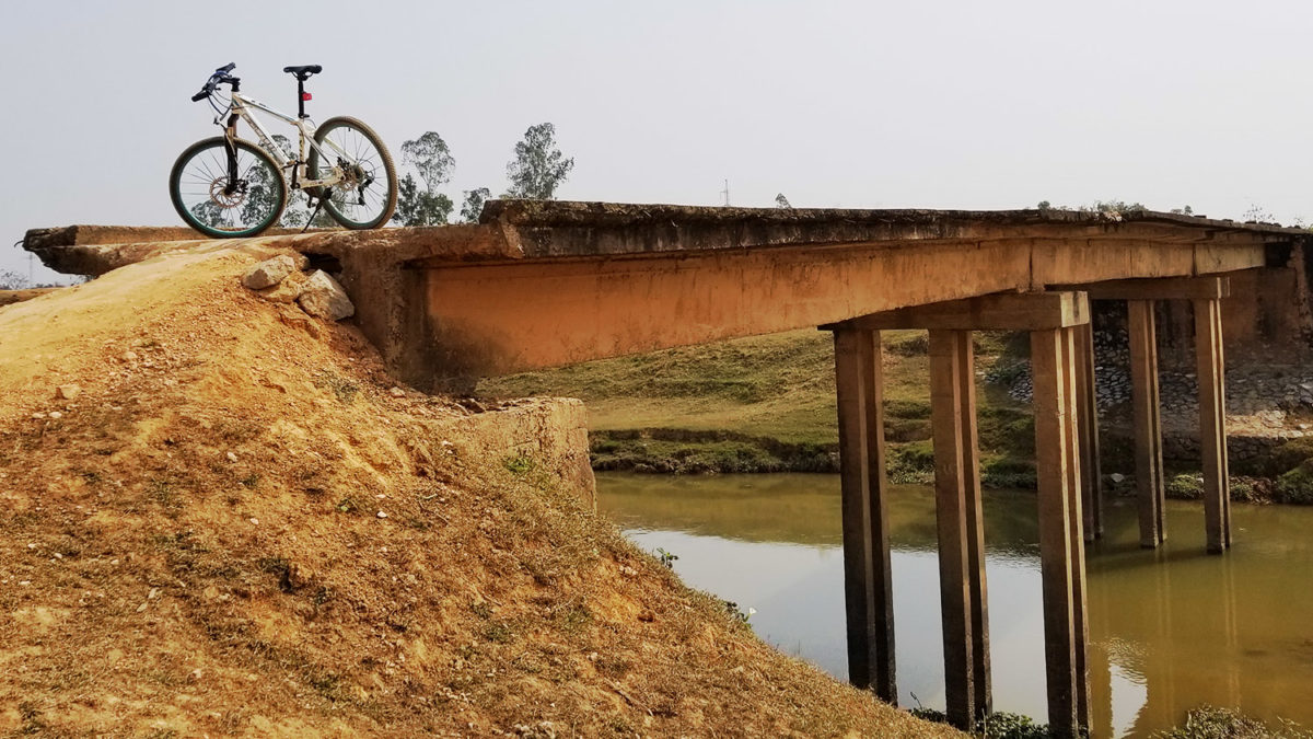 dangerous bridge vietnam cycling countryside