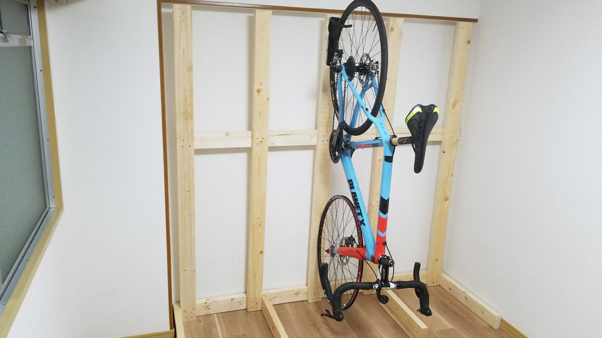 planet x cross bike on wood wall rack phase 1